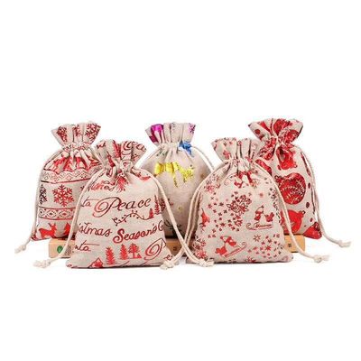 Il sacchetto di Candy dello zaino della borsa di cordone della iuta della tela da imballaggio di Natale insacca l'OEM
